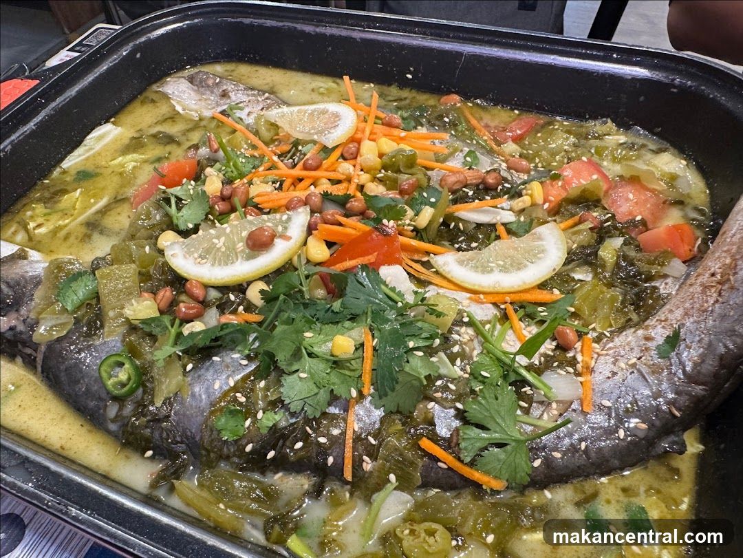 Steamed Fish with Pickled Greens