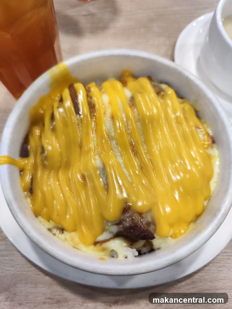Baked Rice with Cheese and Meat