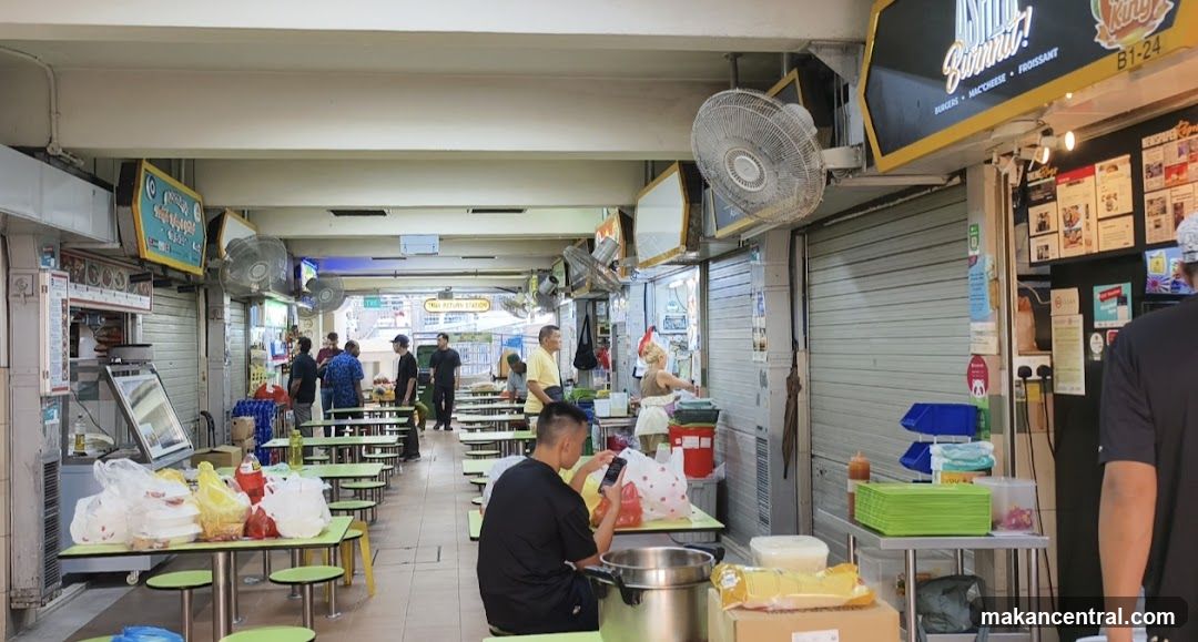 Food court with tables and people