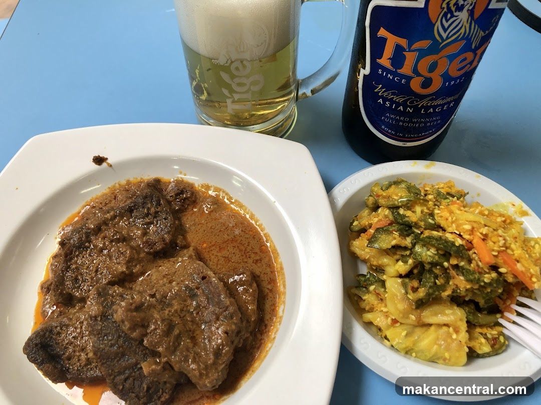 Beef Rendang and Vegetable Dish with Beer
