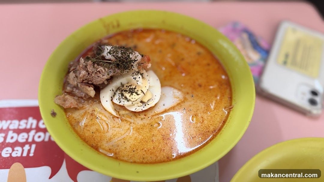 Bowl of Laksa with Egg and Meat