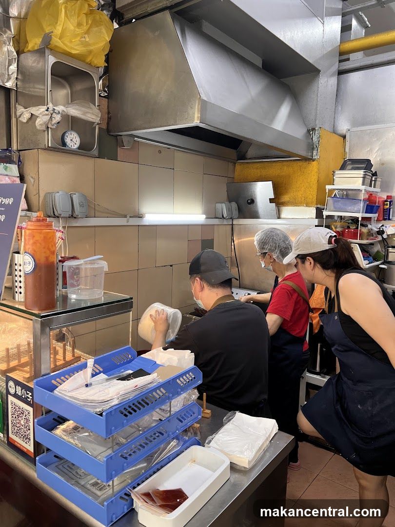 Kitchen Staff Preparing Food