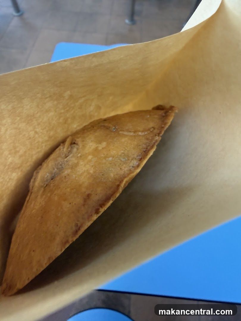 Fried Pastry in Paper Bag