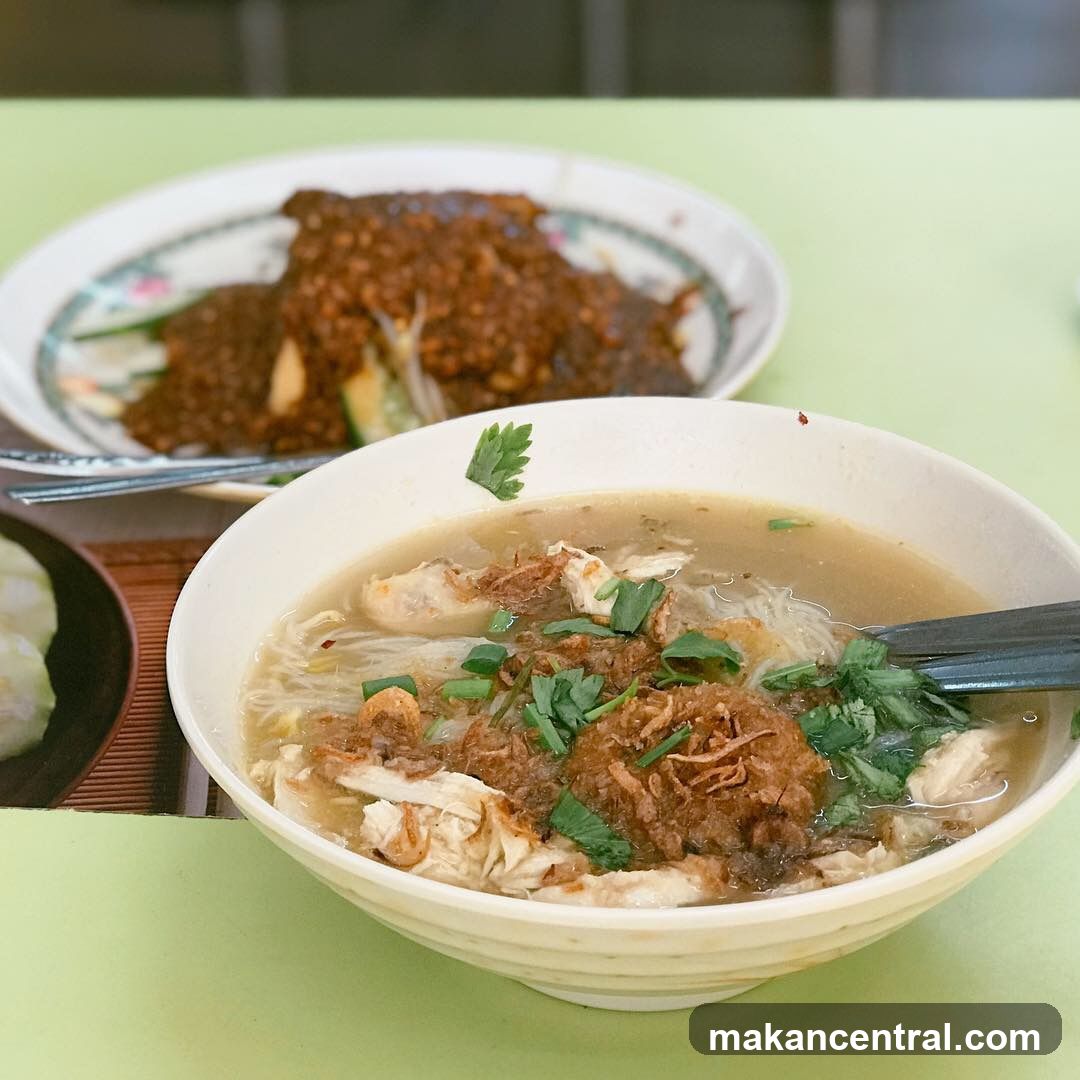 Chicken noodle soup with a side dish
