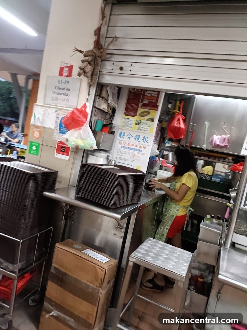 Food stall interior with staff