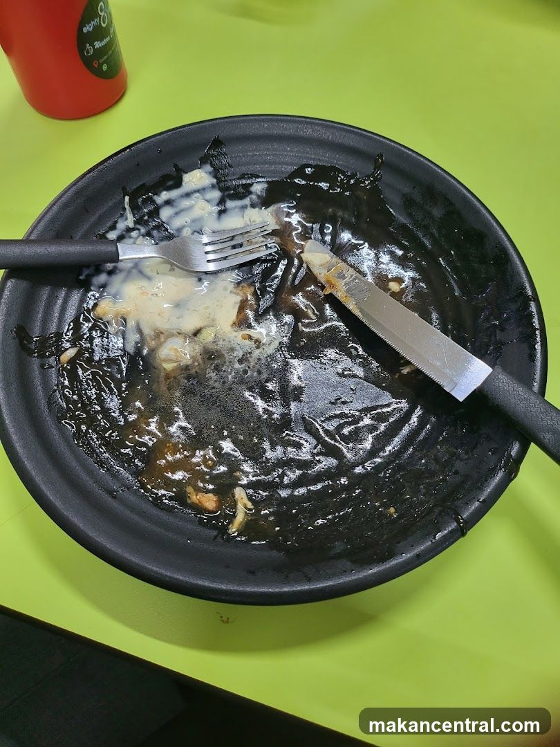 Dirty Plate with Utensils