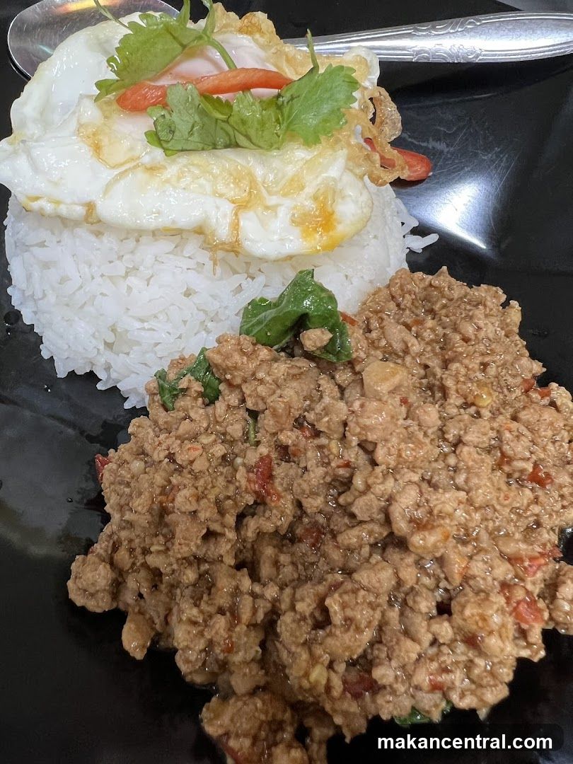 Minced Pork with Basil and Fried Egg over Rice