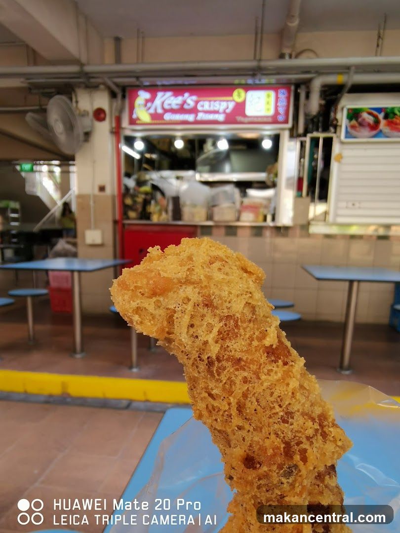 Fried Food Item in Front of a Stall