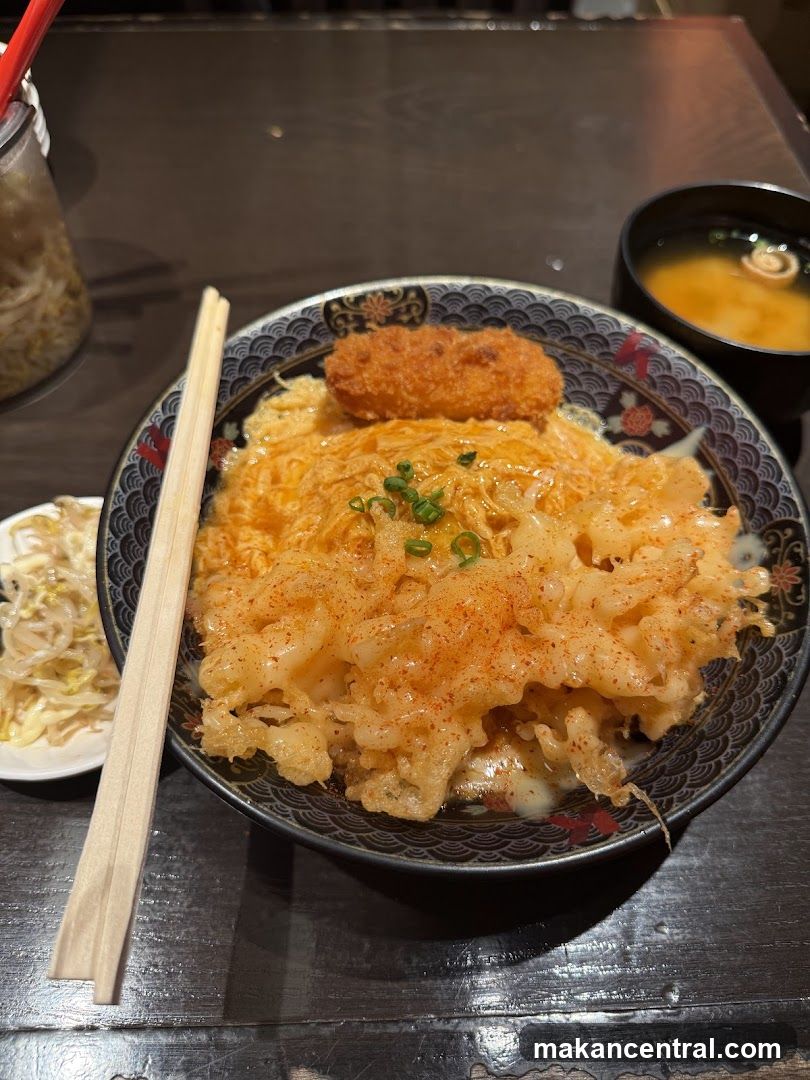 Omurice with a side of miso soup and pickles