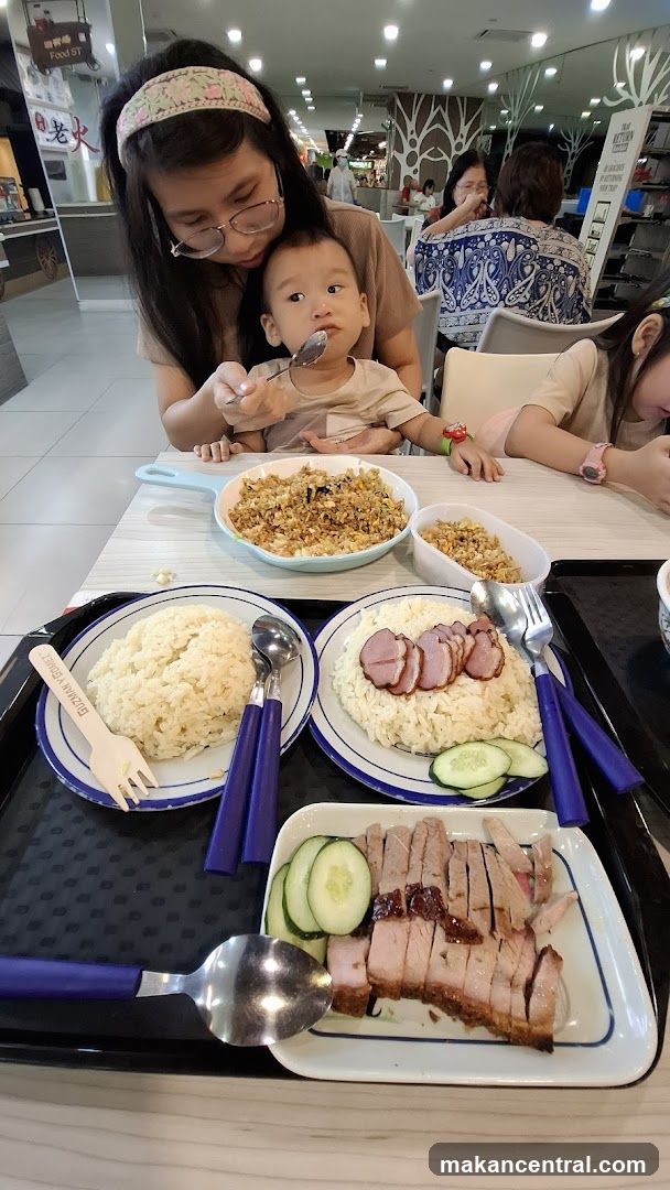 Family Meal at a Food Court