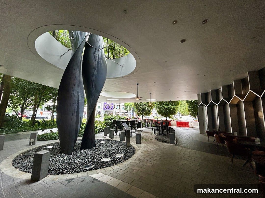 Outdoor Seating Area with Sculpture
