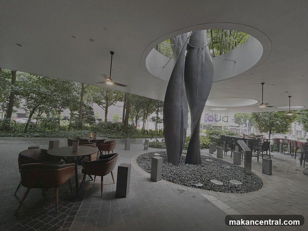Outdoor Seating Area with Sculpture