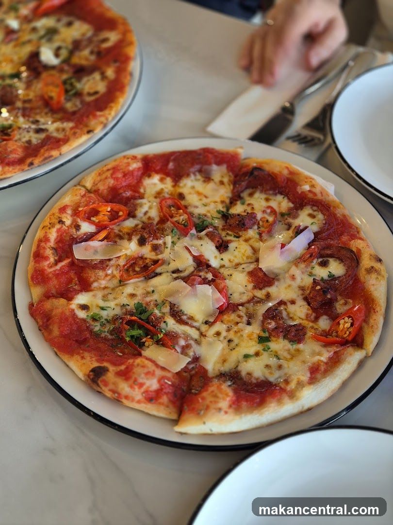 Two Pizzas on a Table