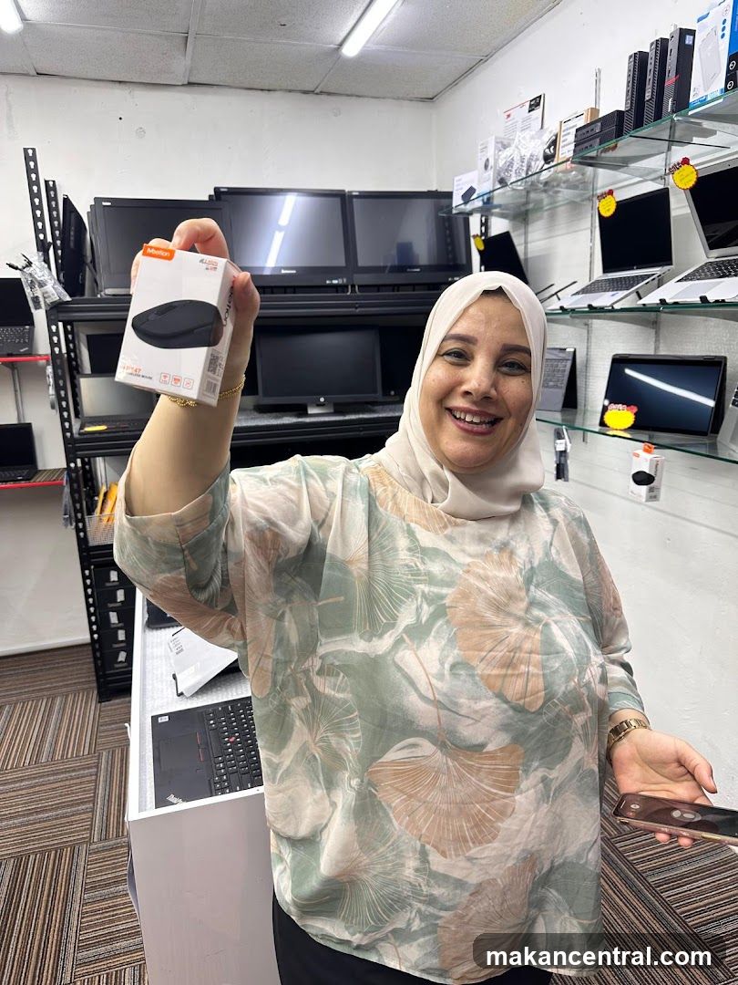 Woman holding a computer mouse box