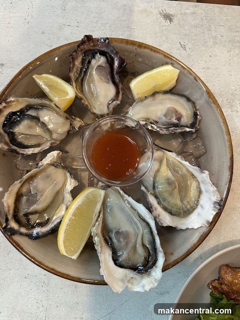 Oysters with Lemon and Sauce