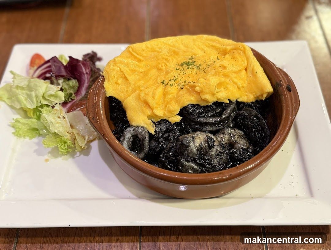 Squid Ink Rice with Omelette and Salad