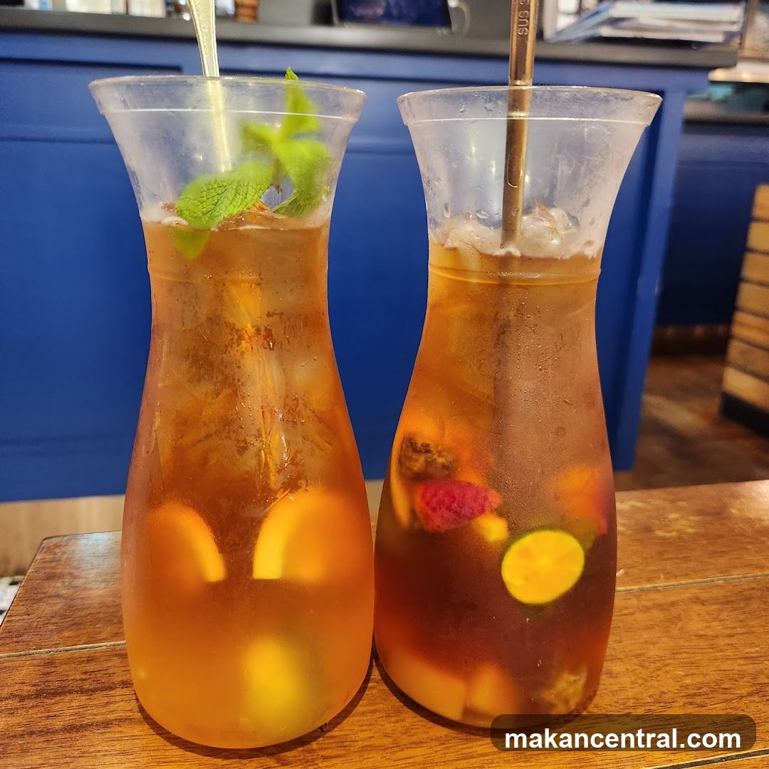 Two pitchers of iced tea