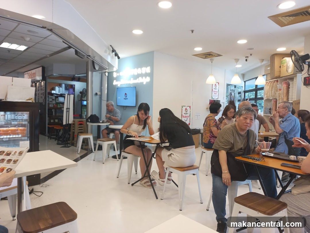 Diners in a bright cafe