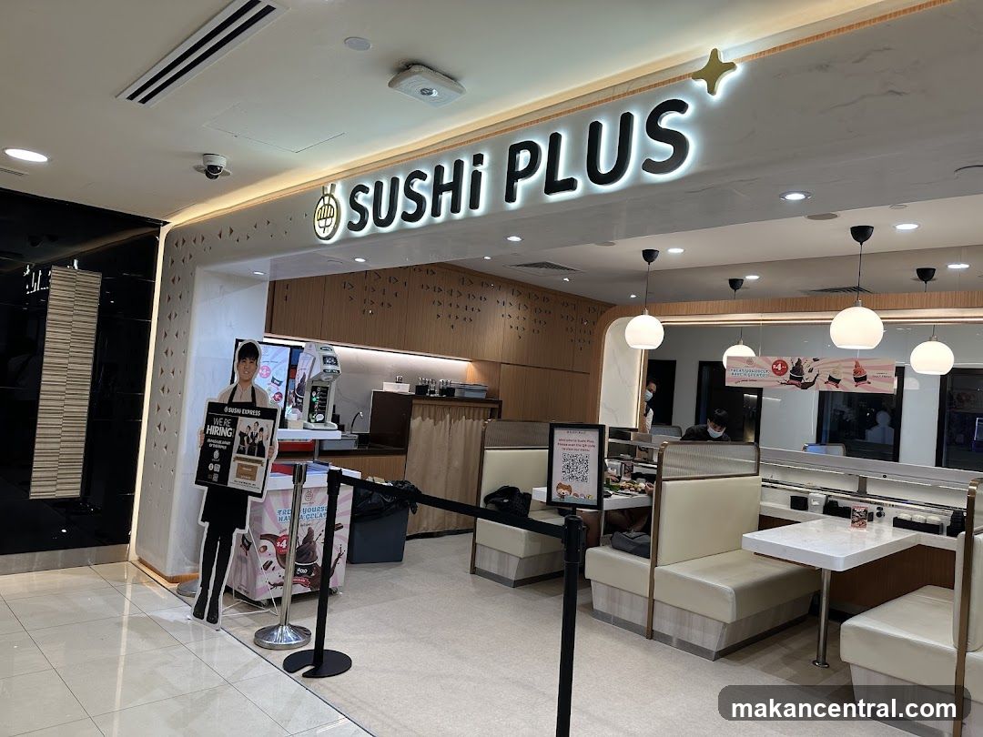 The exterior of a sushi restaurant with a prominent "SUSHI PLUS" sign. Inside, there are booths and tables, a sushi conveyor belt, and staff members. A cutout of a person holding a "WE'RE HIRING" sign is visible near the entrance.