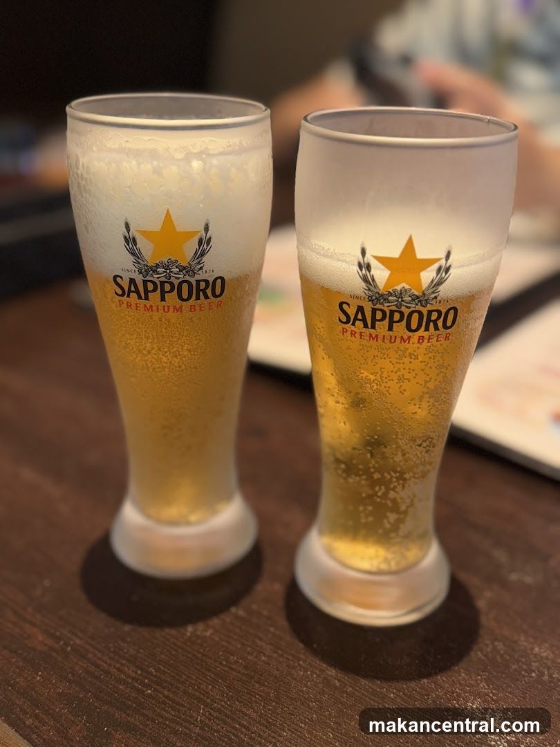 Two glasses of Sapporo Premium Beer