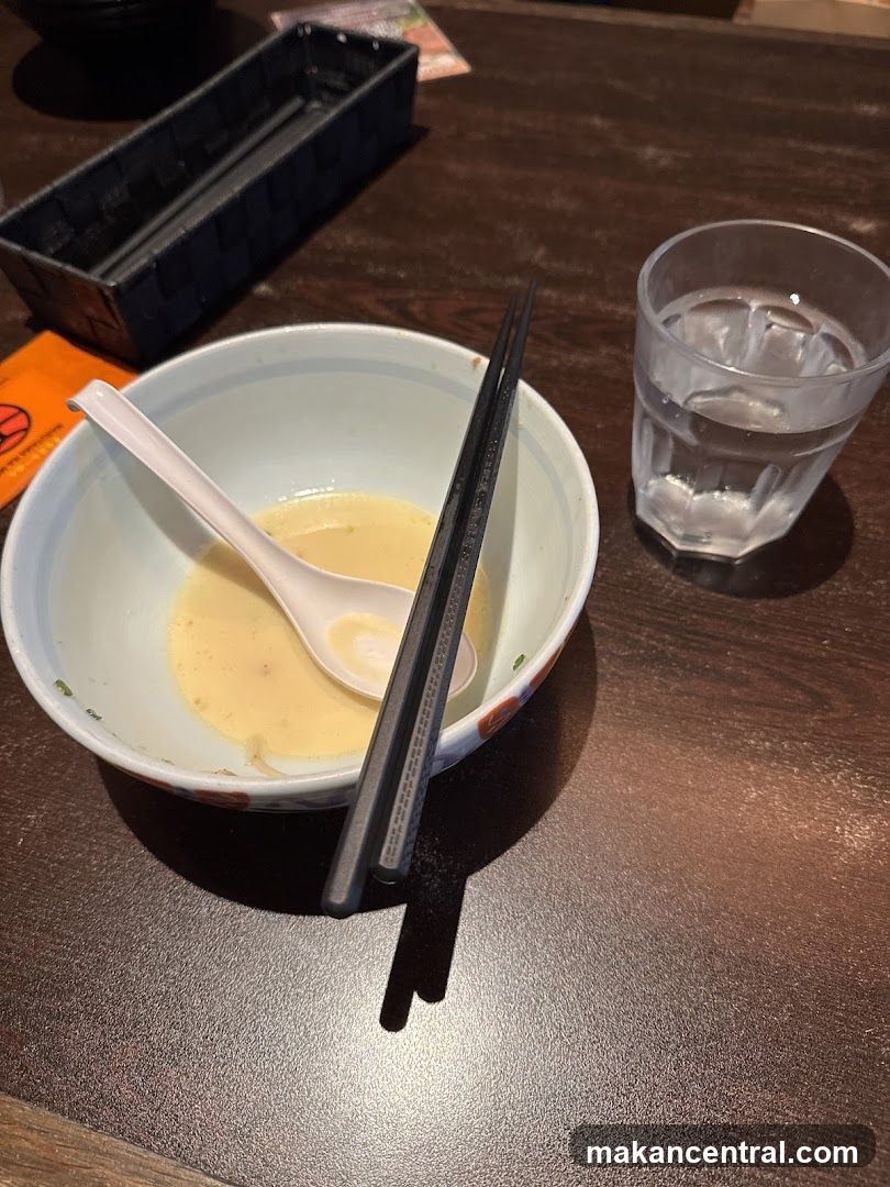 Partially Eaten Ramen Bowl