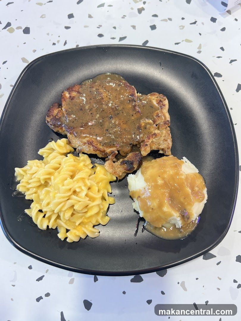 Chicken steak with pasta and mashed potatoes