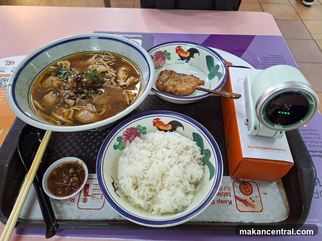 Food Tray with Noodles, Rice, and Pork Chop