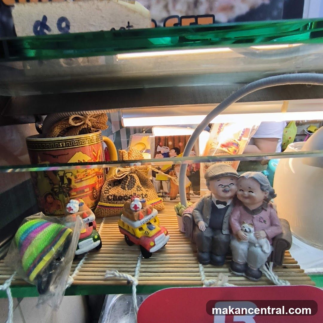Display Case with Figurines and Mug