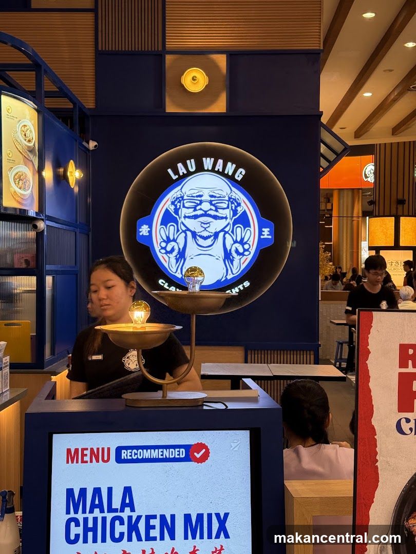 Restaurant Interior with Logo and Menu Display