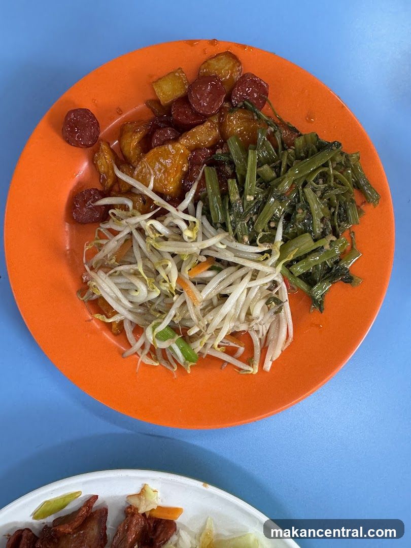 Plate of Stir-Fried Vegetables and Sausage