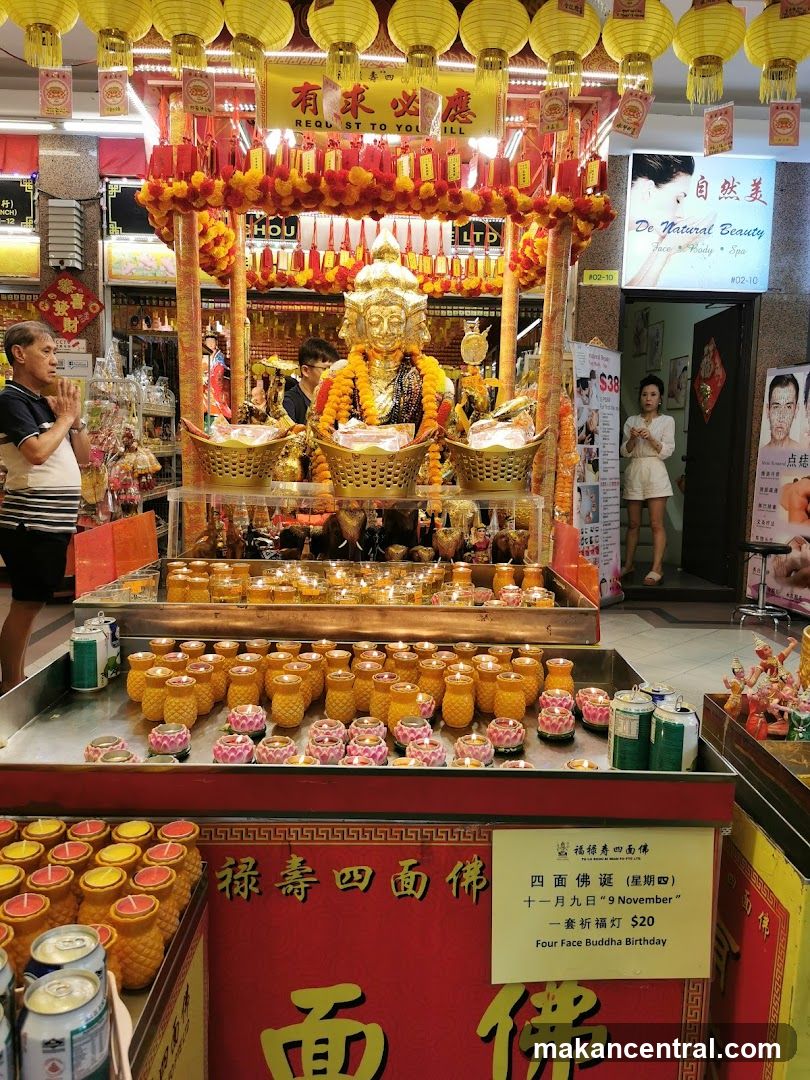 Buddhist Altar with Candles and Offerings