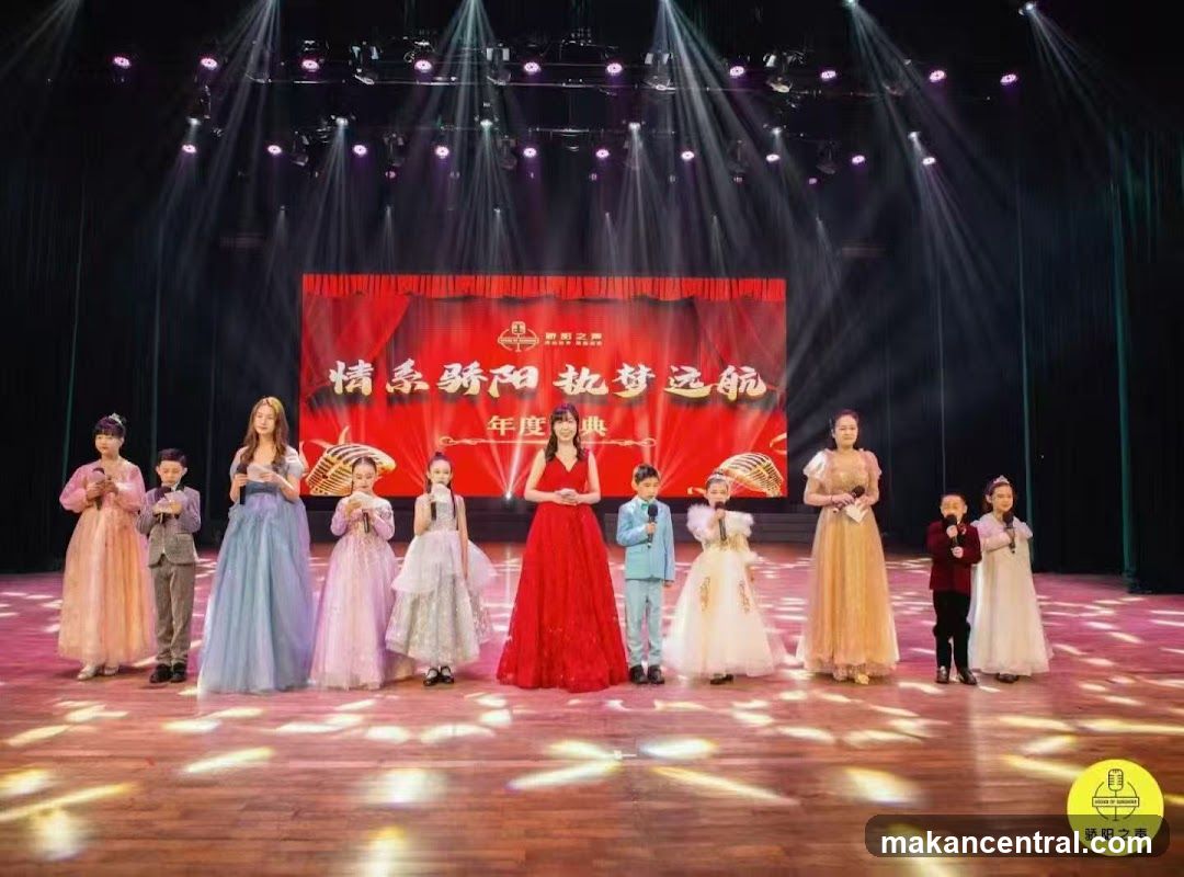 Children and adults on stage for an event