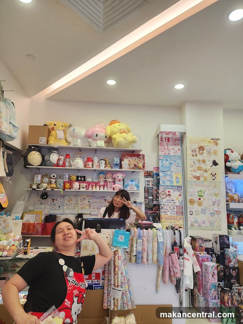 Two Women Posing in a Store