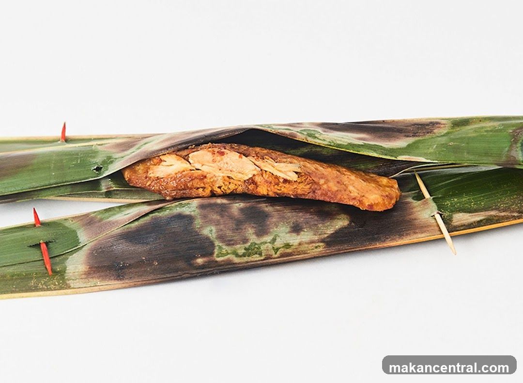 Food item wrapped in leaves