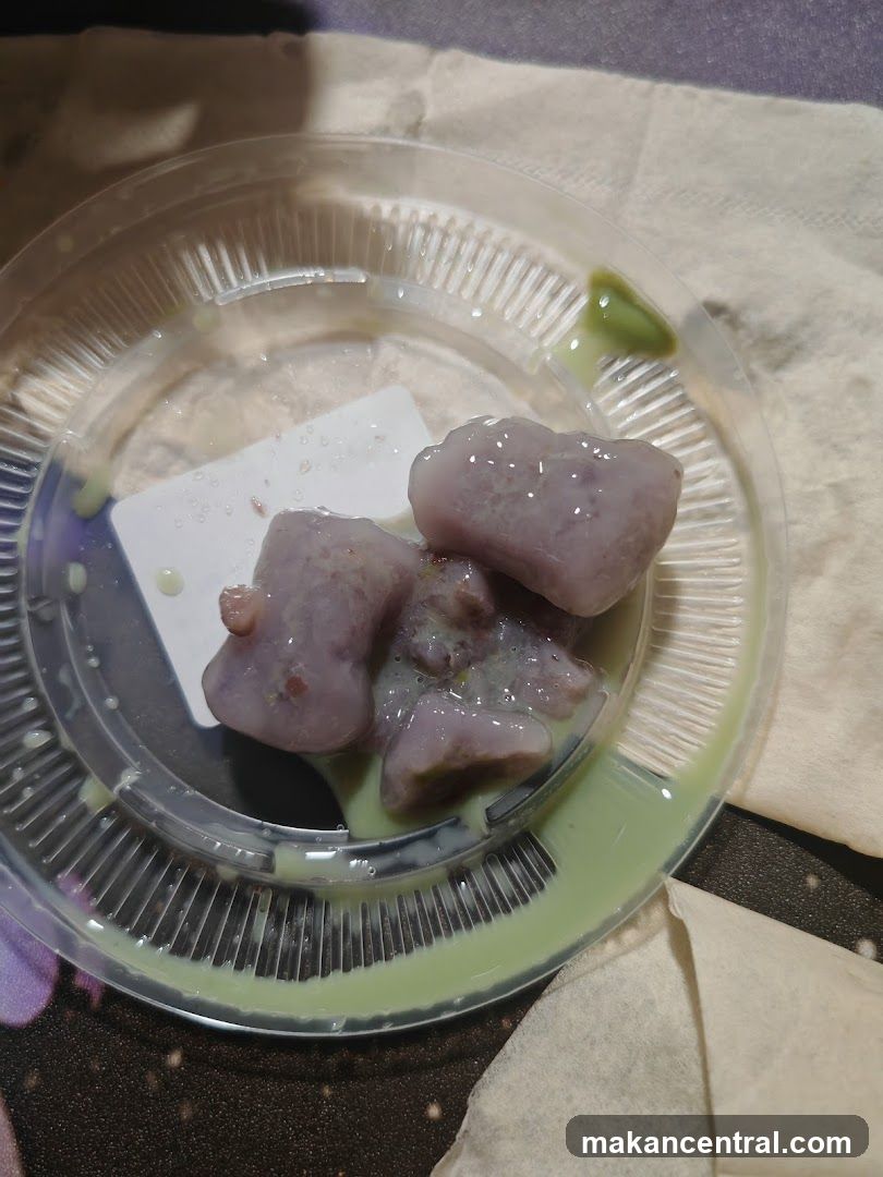 Purple dessert with green sauce