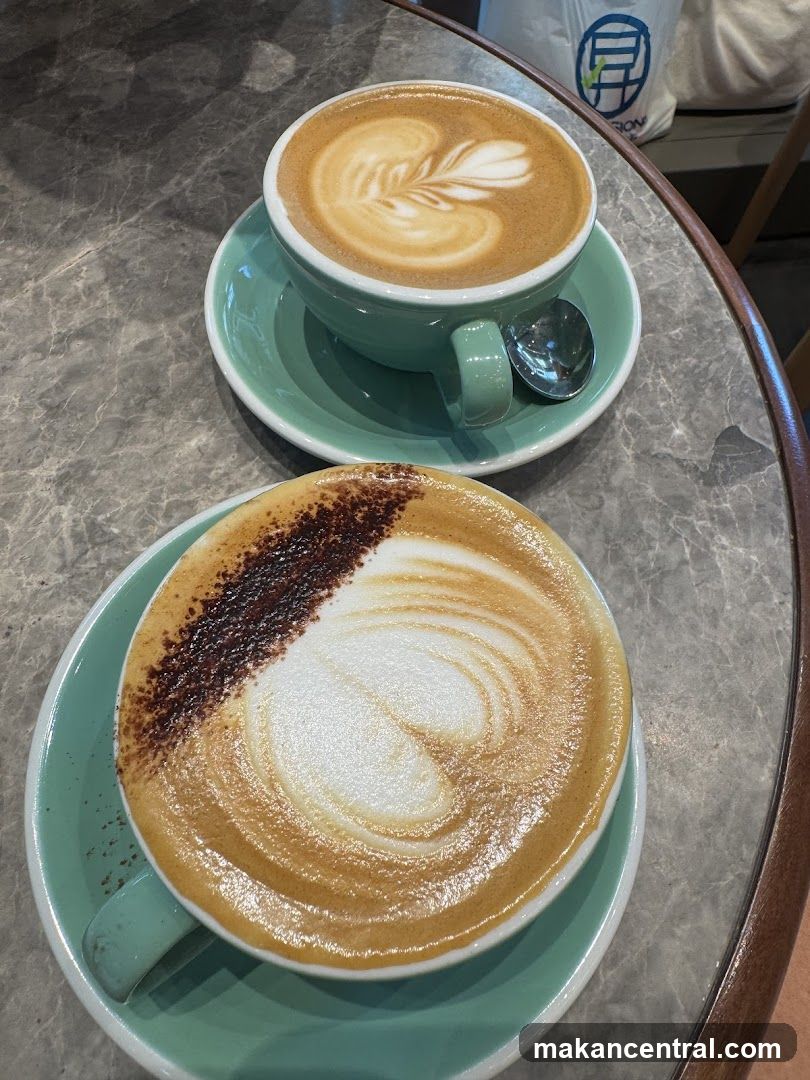Two coffees with latte art