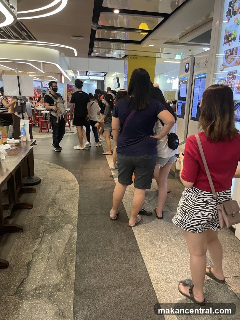 People queuing at a food court
