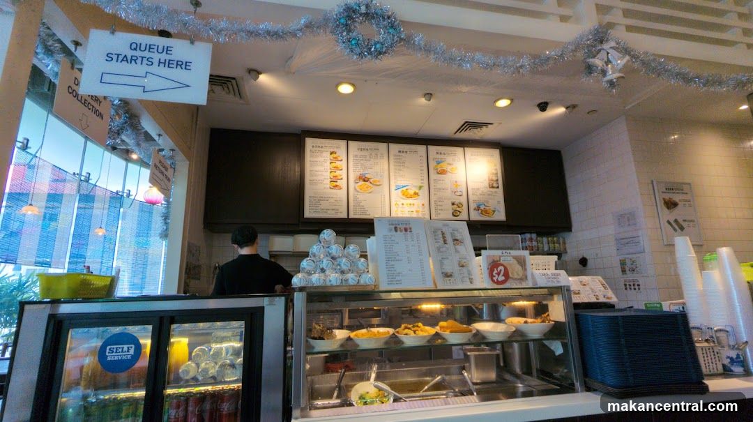 Restaurant counter interior with queue signage and display