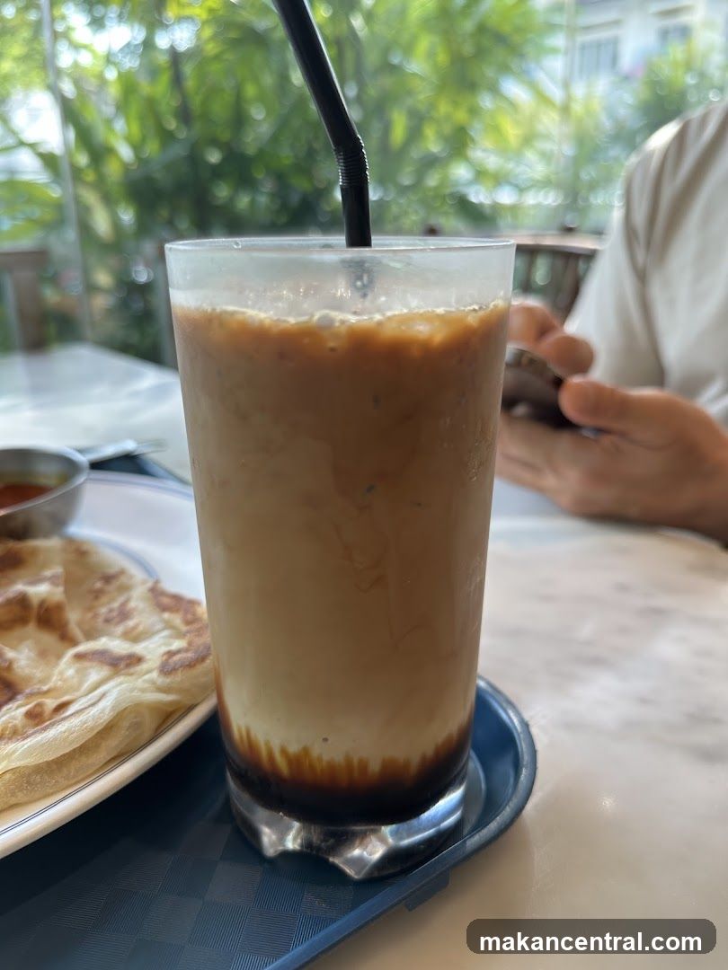 Iced coffee and roti at café
