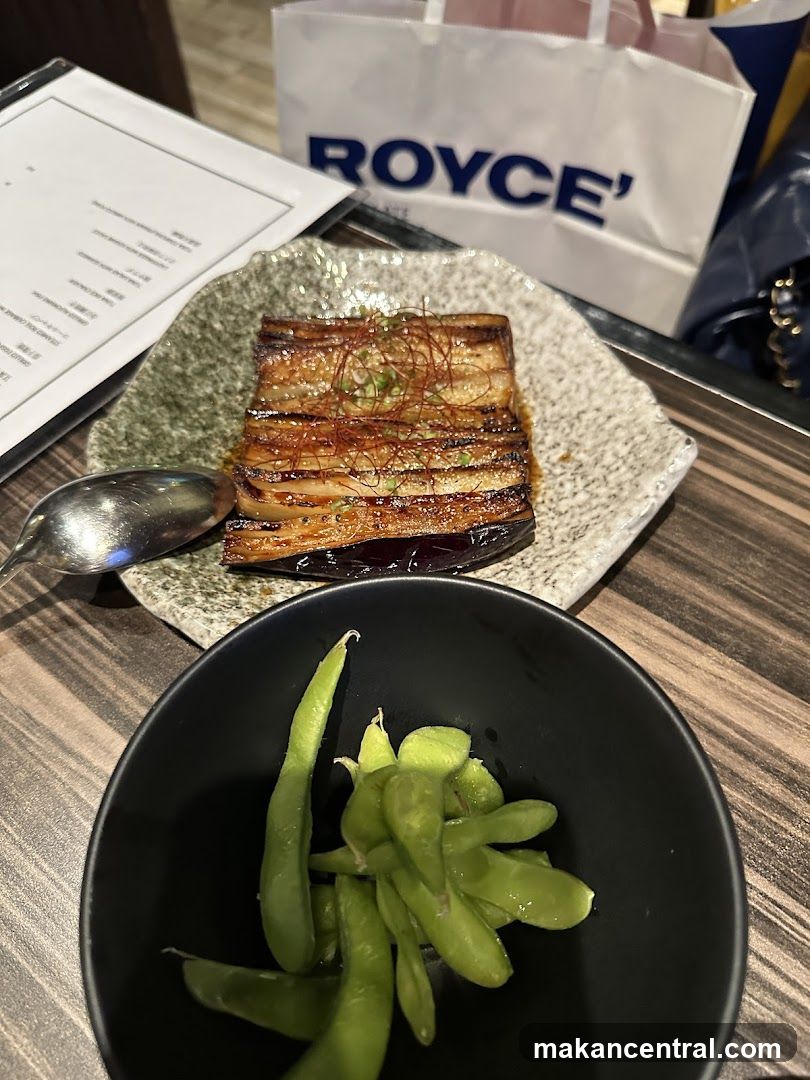 Dining Table with Food and Branded Bag