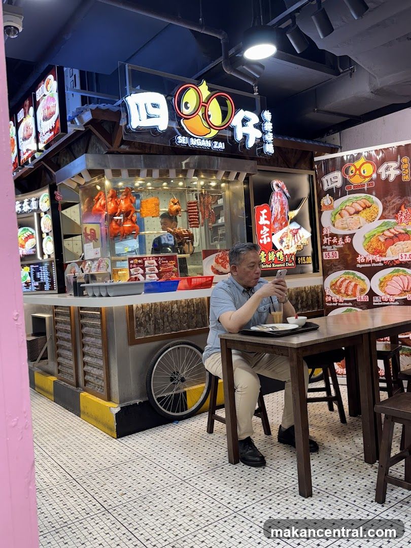 Interior of food stall with customer seated
