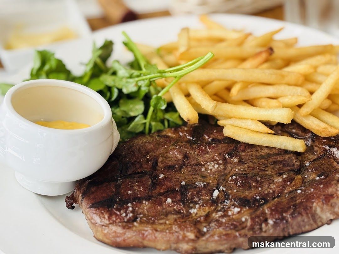 Grilled Steak with Fries and Greens