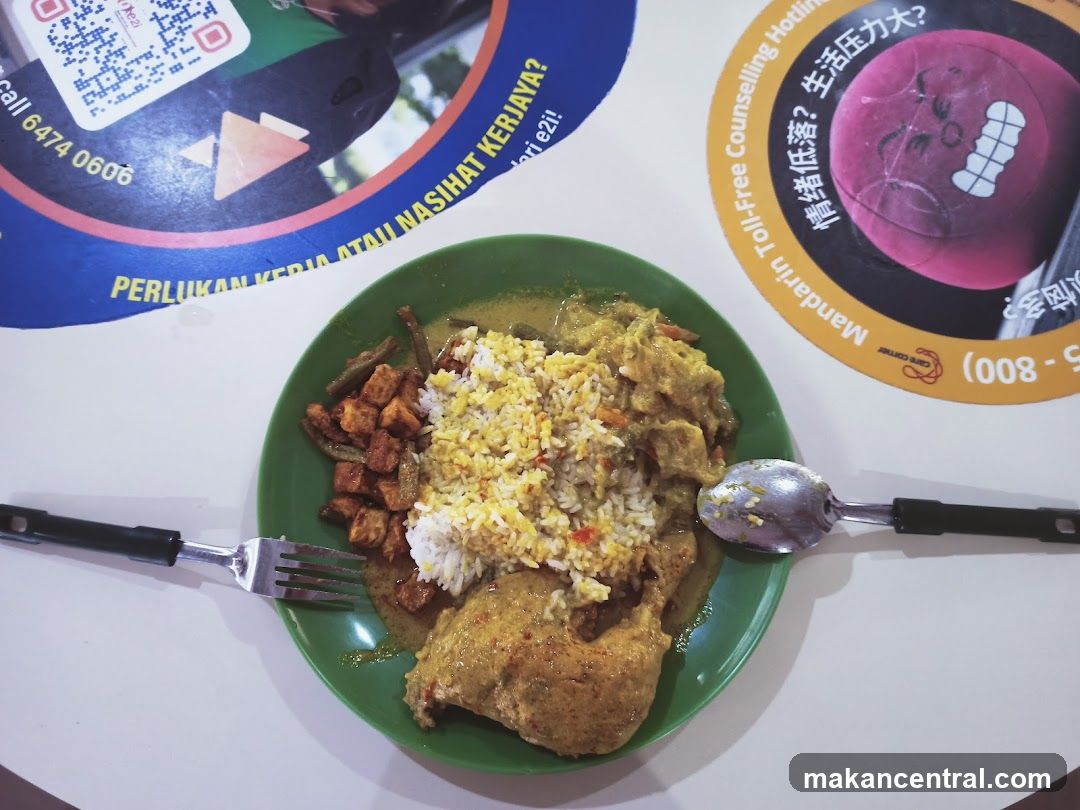 Food served at a dining table with promotional posters