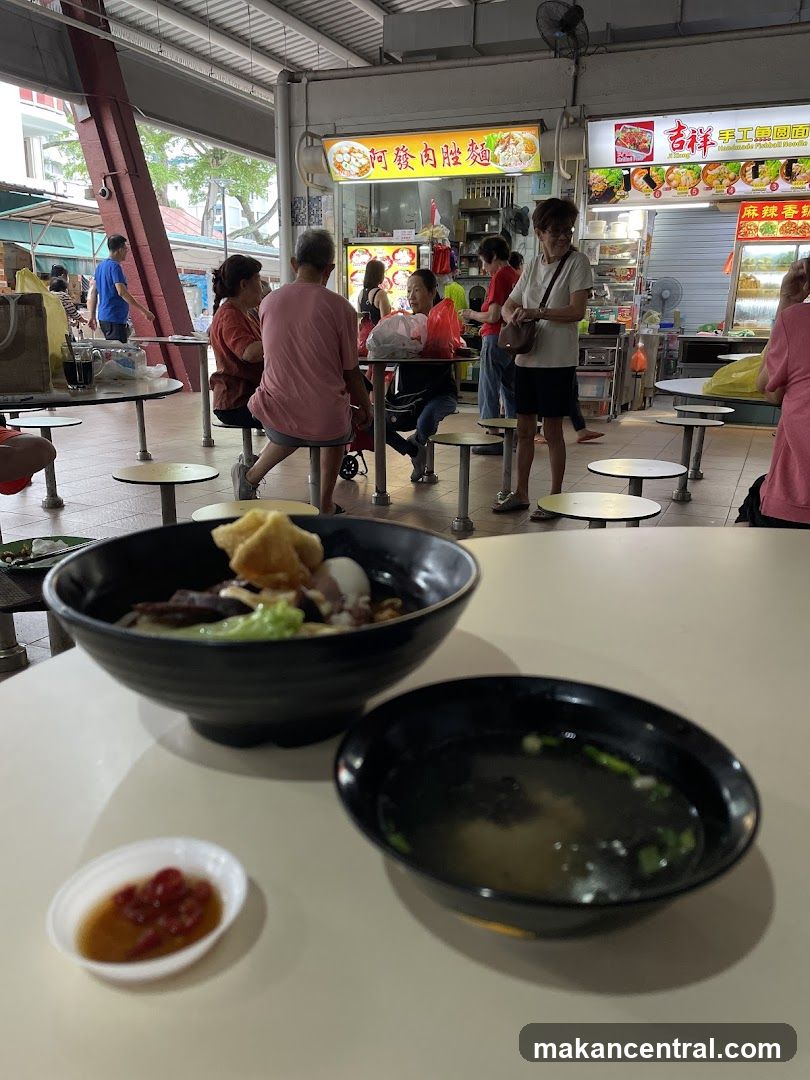 Food court interior with diners and stalls