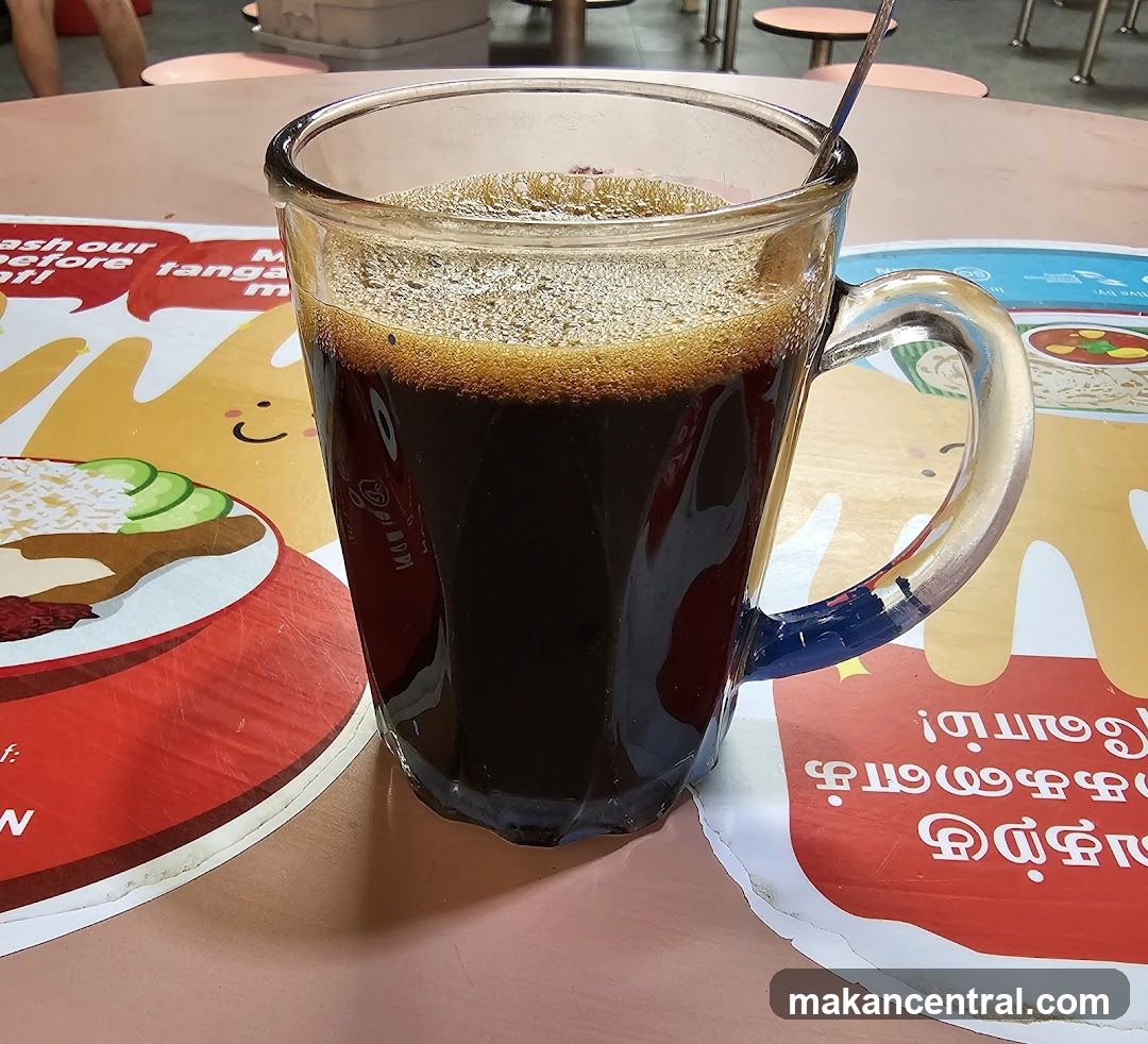 Coffee in a glass mug on a table