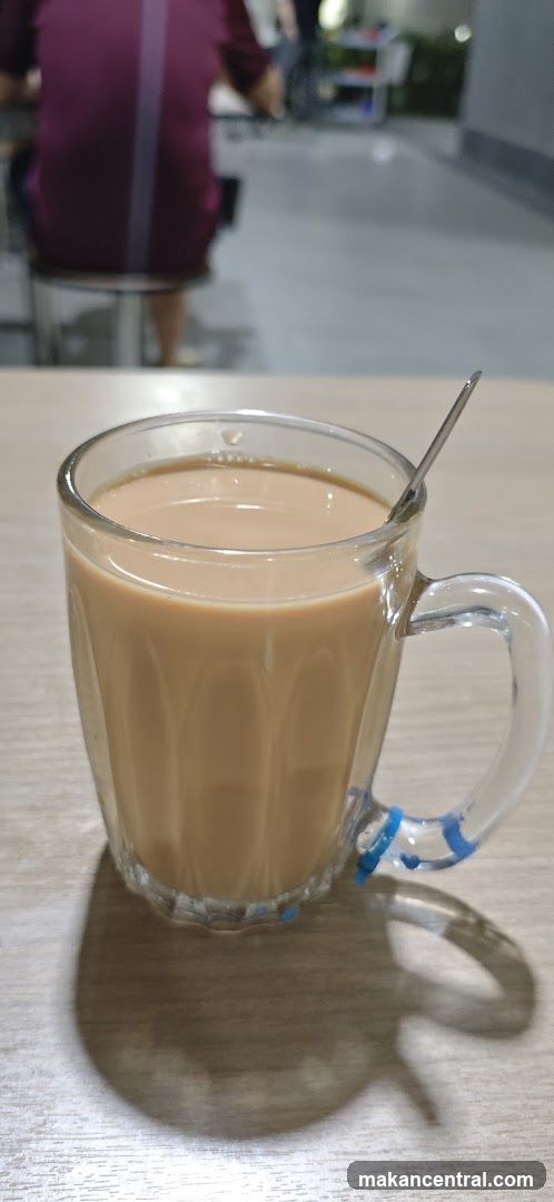 Tea in glass mug on table