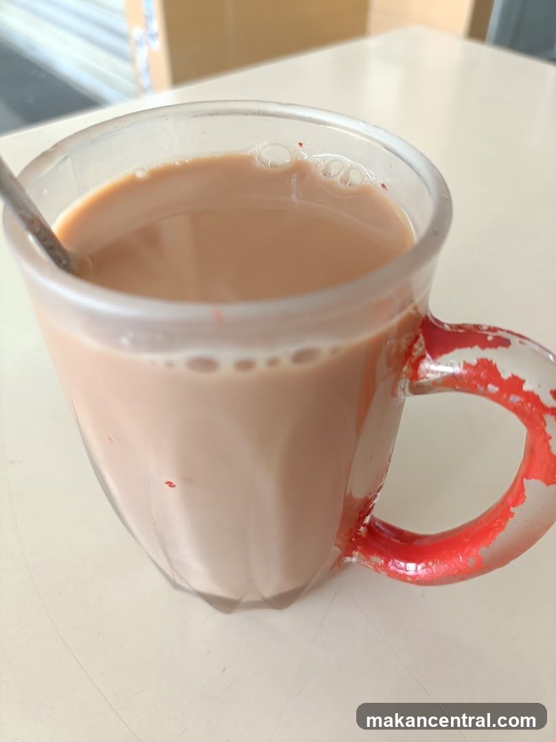 Mug of beverage on table