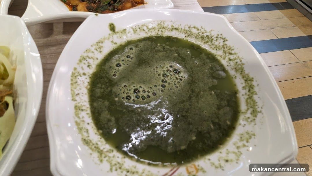Dining Table with Green Soup