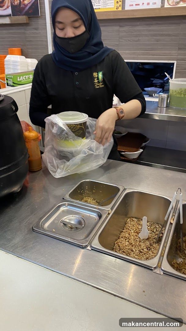 Staff at counter preparing food
