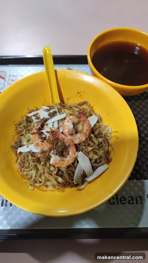 Food served in yellow bowl with side dish